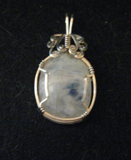 P-41 Moonstone cabochon wrapped in sterling silver $35.jpg